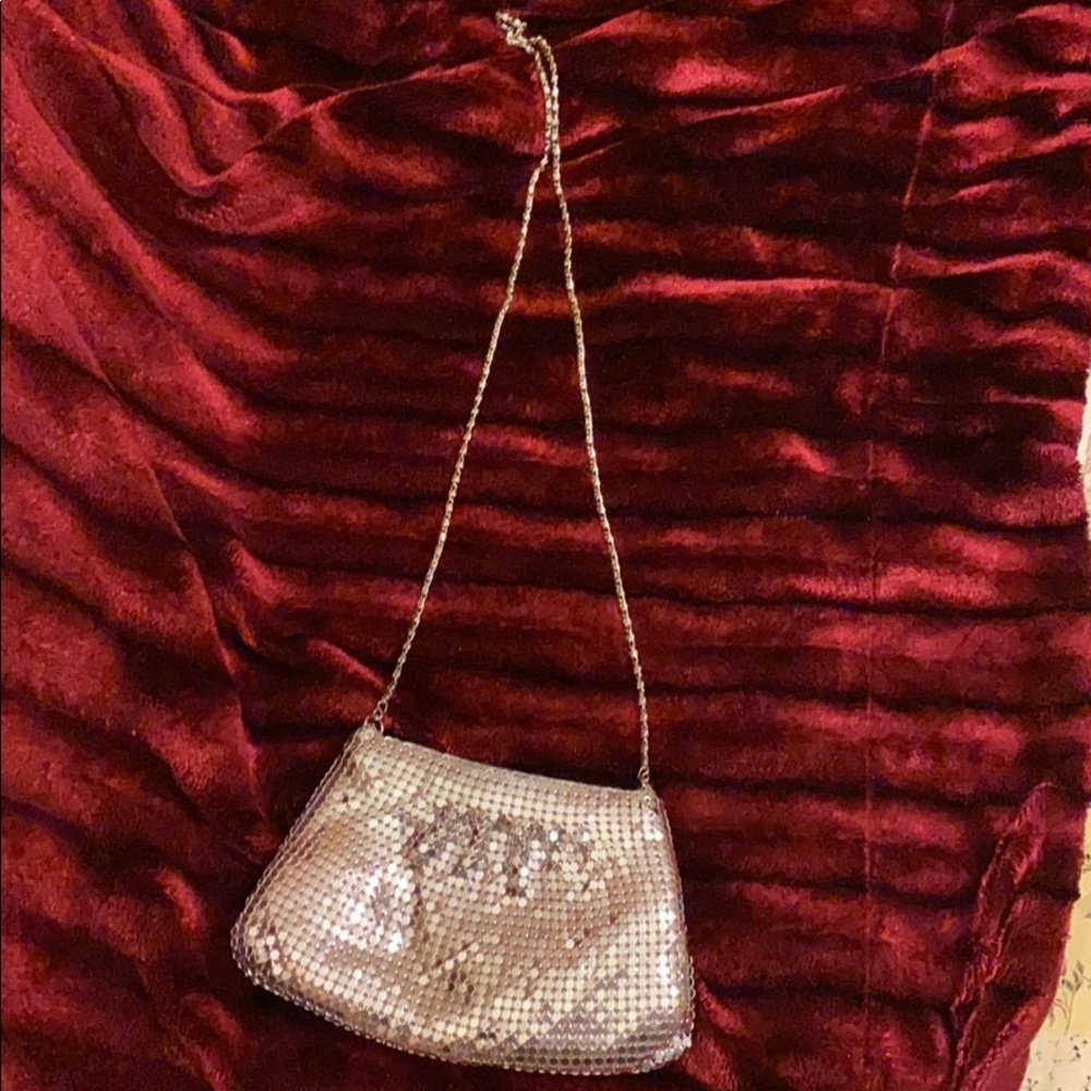 Sequin silver clutch.
